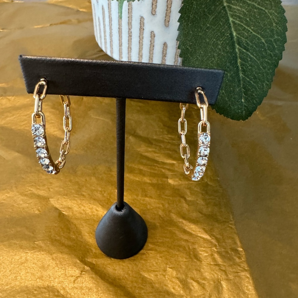 Gold tone earrings with CZ’s